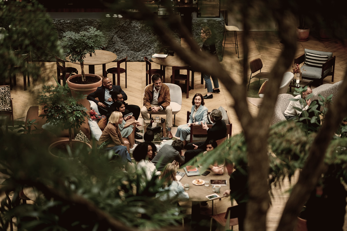 Colleagues having a coffee break in a modern office building in Paris, France