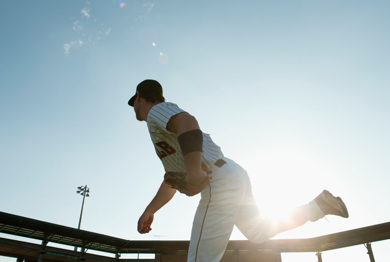 Baseball Pitcher Practicing in a Stadium - Athletes & Entertainment